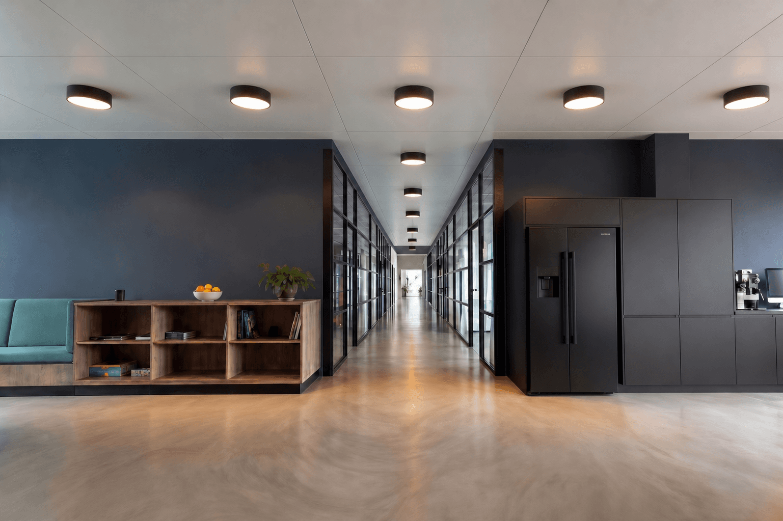 Modern commercial corridor — PINARS LLC supplies specified hardware for controlled commercial environments across the United States.